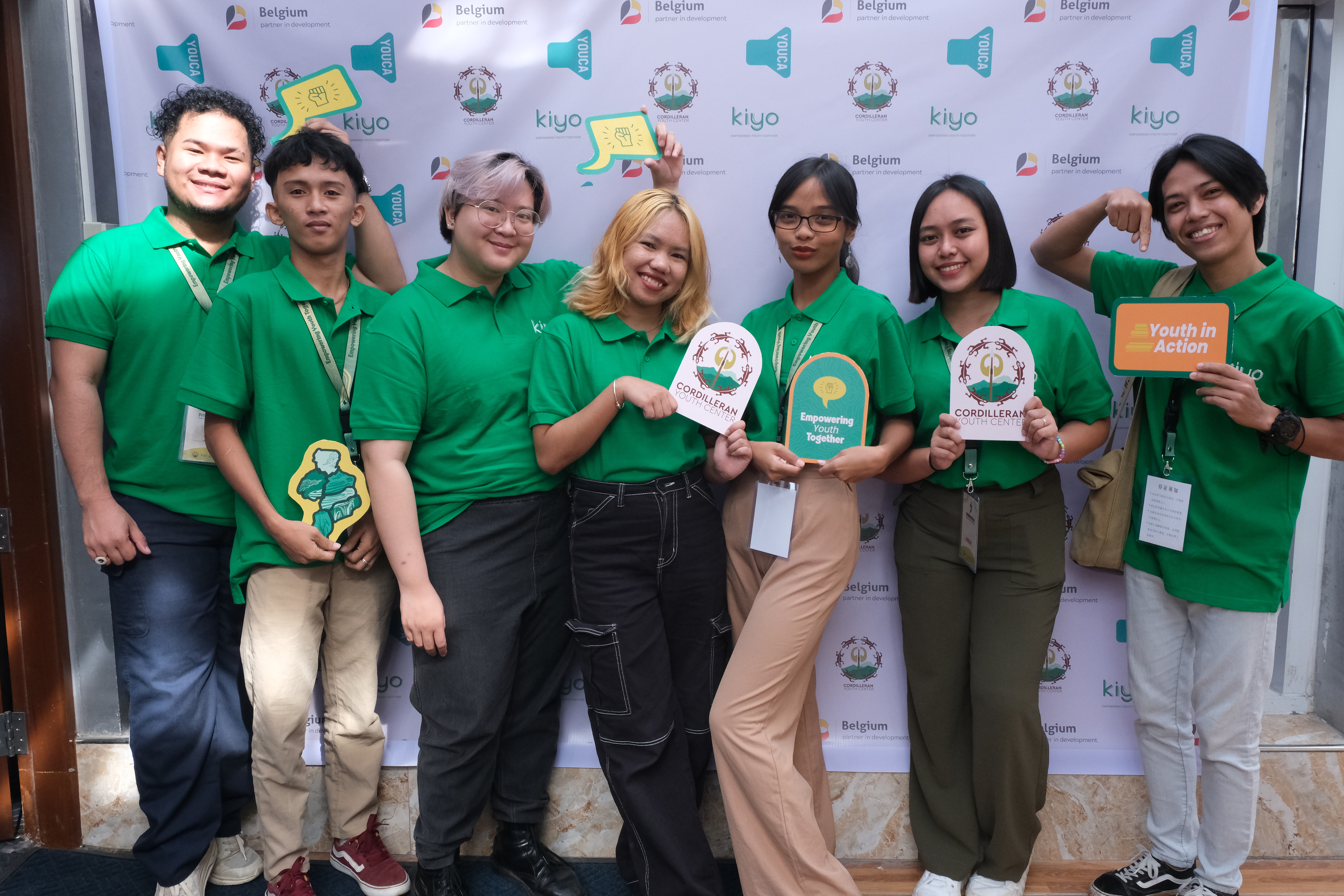 7 youth members of the NYAB posing and smiling.